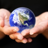 Earth in hands. Glass World